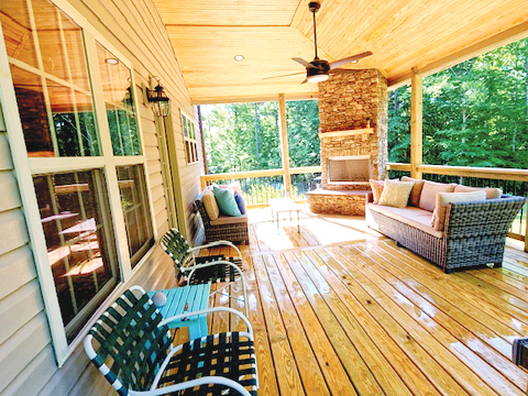 outdoor screen porch with wood ceiling